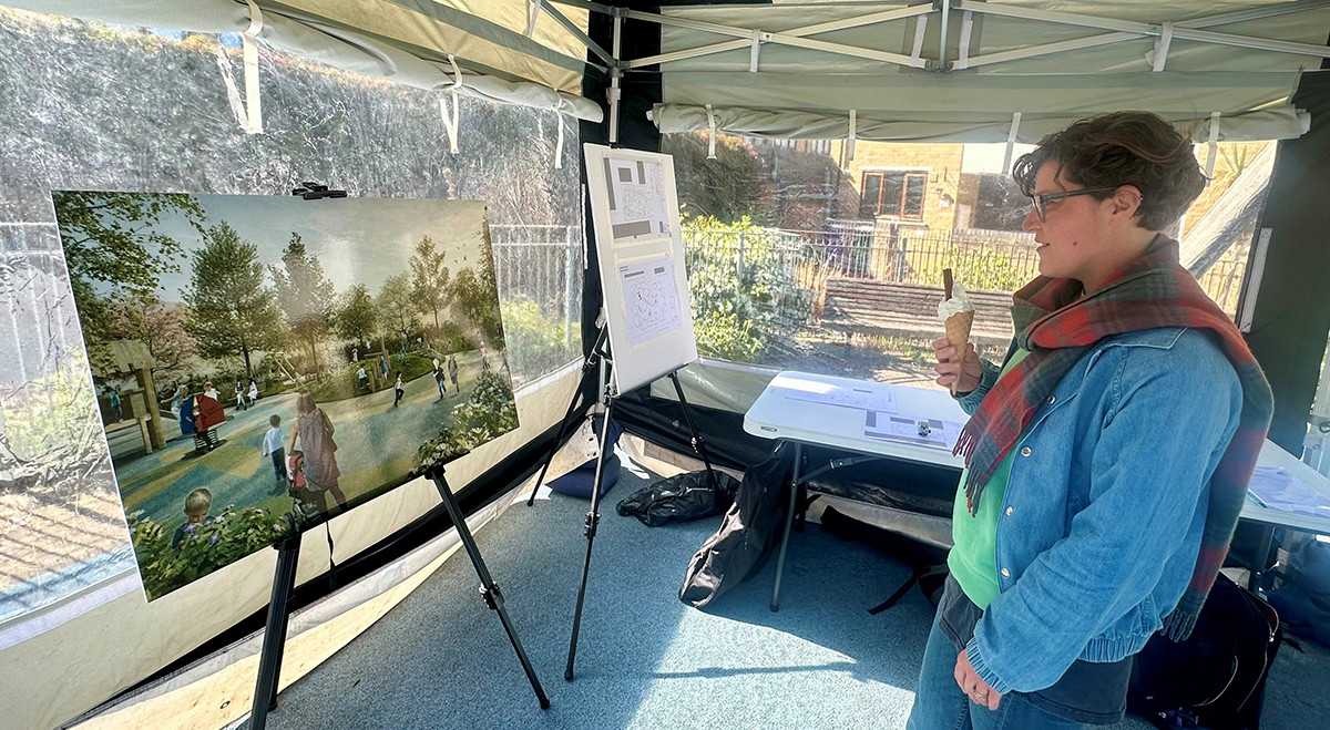 Person looking at the plans
